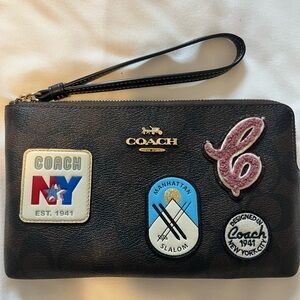 Coach Dark Brown Wristlet with Patches